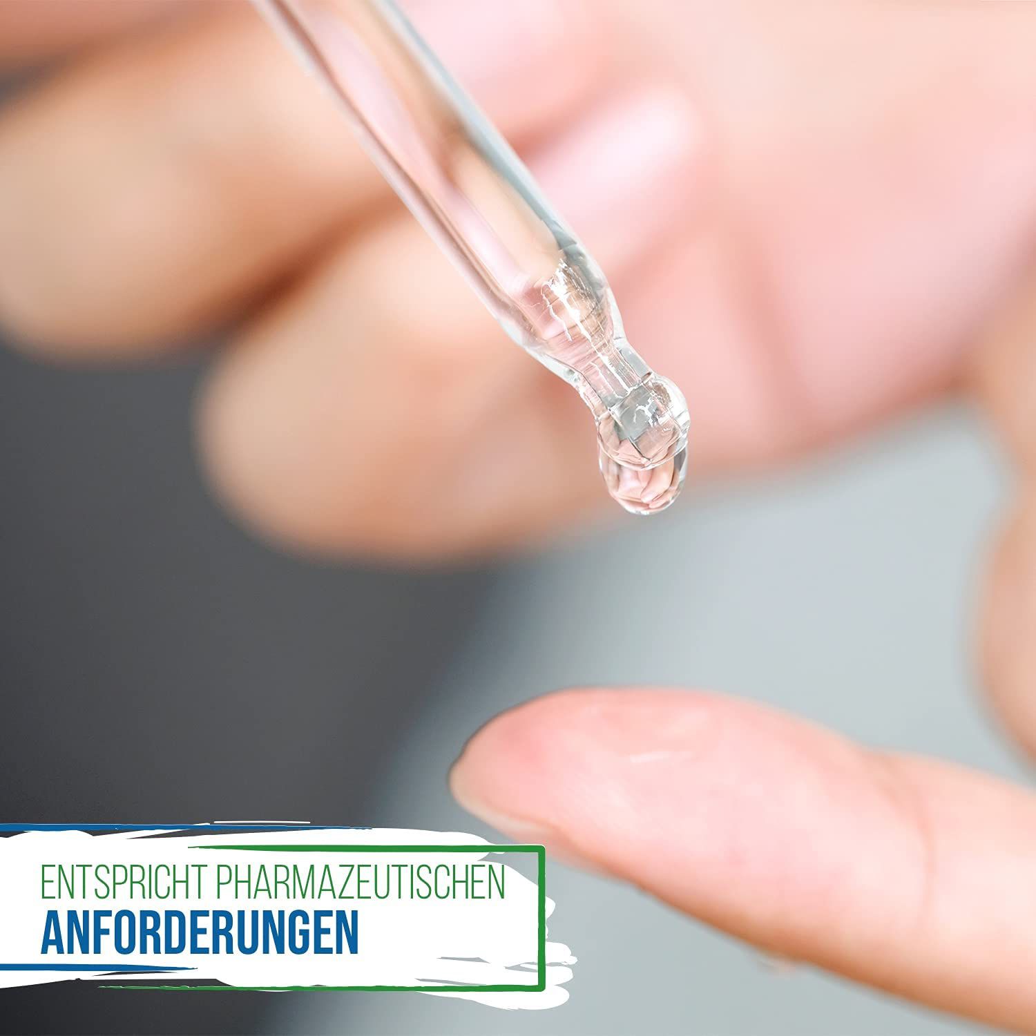 aus einer gläsernen Pipette tropft Flüssigkeit auf einen Finger aus einer gläsernen Pipette tropft Flüssigkeit auf einen Finger